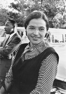 Rosa Parks in 1955, with Martin Luther King, Jr. in the background