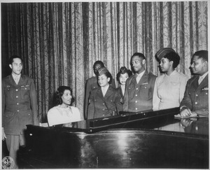 Anderson entertains a group of overseas veterans and WACs on the stage of the San Antonio Municipal Auditorium