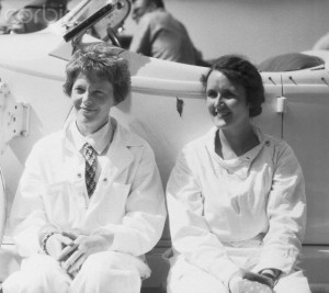 July 4, 1933: "Ruth Nichols and Amelia Earhart in Try for New Records.Los Angeles, California: Amelia Earhart (left) and Ruth Nichols (right), two of the nations' foremost women fliers, seen as they attended the last day's events of the National Air Races at Los Angeles, July 4th. They will attempt to establish a new transcontinental speed record for women in a flight from west to east, taking off from Los Angeles, July 6th."